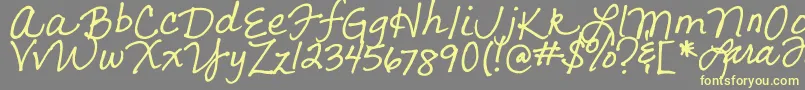 LarasLetters-fontti – keltaiset fontit harmaalla taustalla