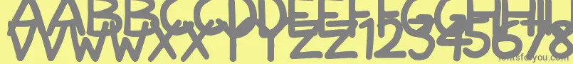NerdyNorms-Schriftart – Graue Schriften auf gelbem Hintergrund