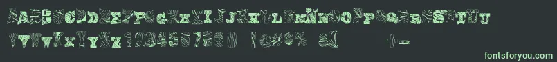 フォントComiceoodwork – 黒い背景に緑の文字