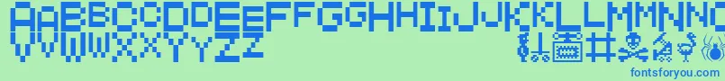 フォントManicMiner – 青い文字は緑の背景です。