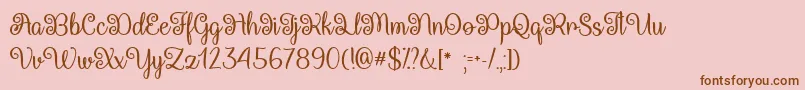 QueenXylophiaOtf Font – Brown Fonts on Pink Background