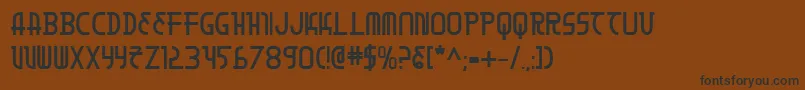 フォントMoonDartBold – 黒い文字が茶色の背景にあります