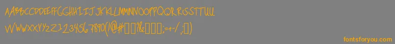 Czcionka TeacherScribble – pomarańczowe czcionki na szarym tle