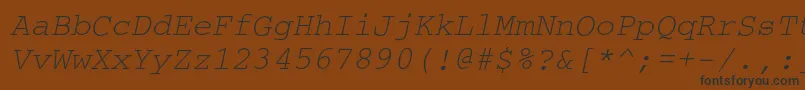 フォントCouriercItalic – 黒い文字が茶色の背景にあります