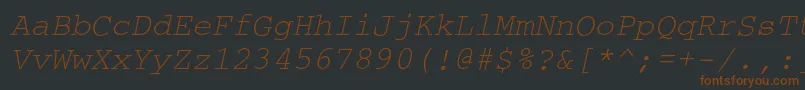 Шрифт CouriercItalic – коричневые шрифты на чёрном фоне
