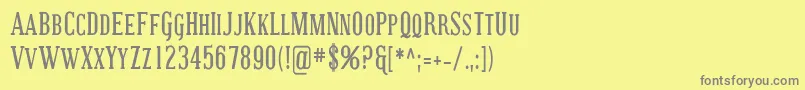 フォントCovingtonScCondBold – 黄色の背景に灰色の文字