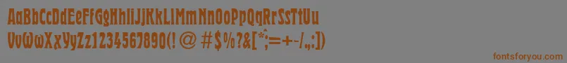 フォントHermanRegular – 茶色の文字が灰色の背景にあります。