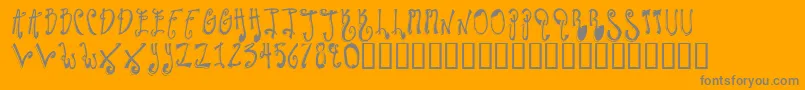 TwilightExpress-Schriftart – Graue Schriften auf orangefarbenem Hintergrund