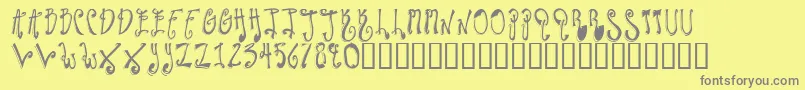 TwilightExpress-Schriftart – Graue Schriften auf gelbem Hintergrund