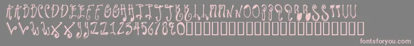 TwilightExpress-fontti – vaaleanpunaiset fontit harmaalla taustalla