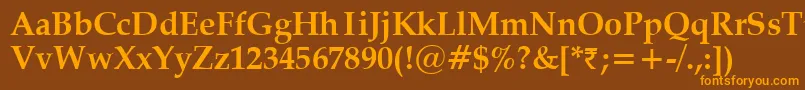 フォントVanielBold – オレンジ色の文字が茶色の背景にあります。