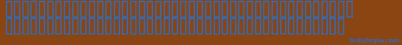 Flyman-fontti – siniset fontit ruskealla taustalla