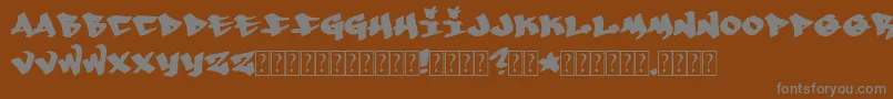 フォントWhoa – 茶色の背景に灰色の文字