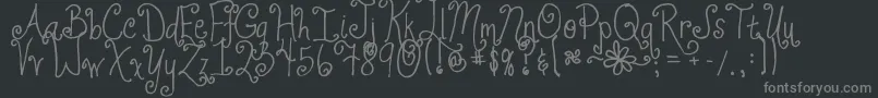JheriCurls-fontti – harmaat kirjasimet mustalla taustalla