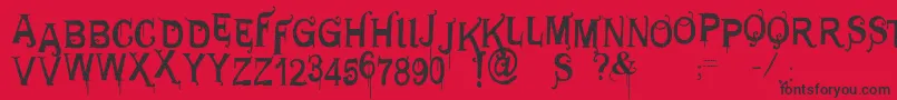 フォントVtksgeneraluse – 赤い背景に黒い文字