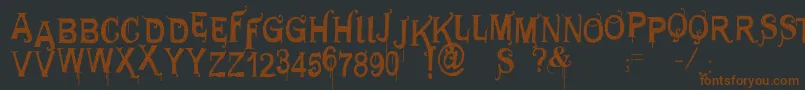 Шрифт Vtksgeneraluse – коричневые шрифты на чёрном фоне