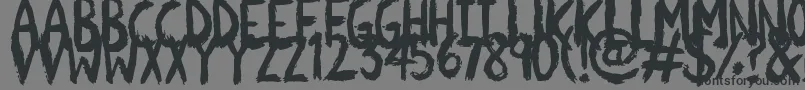 フォントScratchies – 黒い文字の灰色の背景