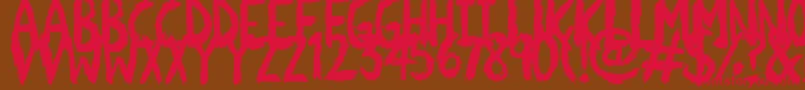 フォントScratchies – 赤い文字が茶色の背景にあります。