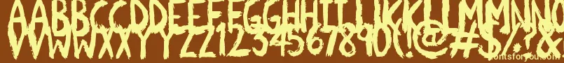 Scratchies-fontti – keltaiset fontit ruskealla taustalla