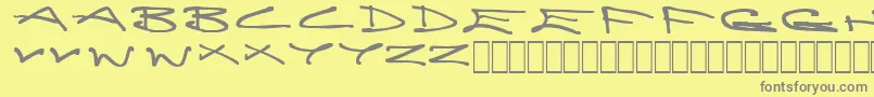 Brain-Schriftart – Graue Schriften auf gelbem Hintergrund