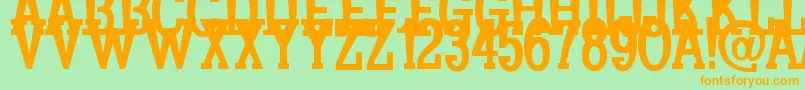 Czcionka Koulouri – pomarańczowe czcionki na zielonym tle