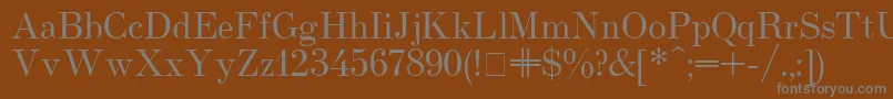 フォントUsualnew – 茶色の背景に灰色の文字