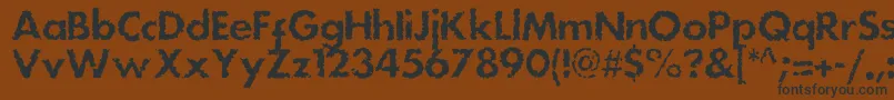 Dsstainc Font – Black Fonts on Brown Background