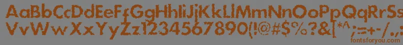 Шрифт Dsstainc – коричневые шрифты на сером фоне