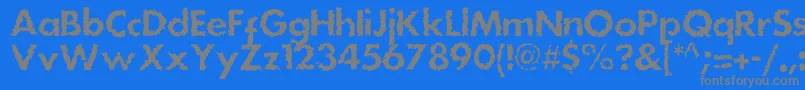 フォントDsstainc – 青い背景に灰色の文字
