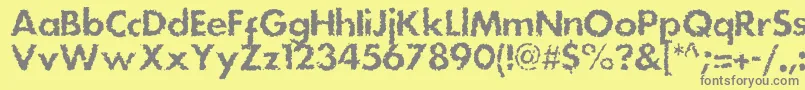 Шрифт Dsstainc – серые шрифты на жёлтом фоне