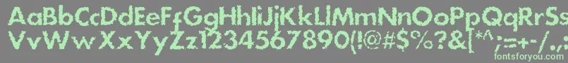 Dsstainc Font – Green Fonts on Gray Background
