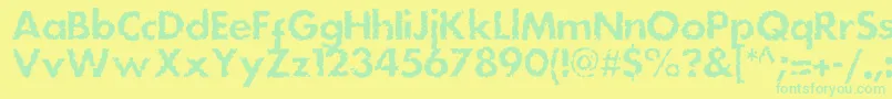 フォントDsstainc – 黄色い背景に緑の文字