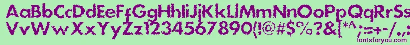 フォントDsstainc – 緑の背景に紫のフォント
