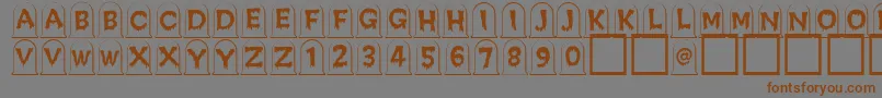 Creepygraves Font – Brown Fonts on Gray Background
