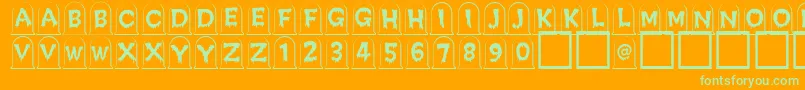 Creepygraves Font – Green Fonts on Orange Background