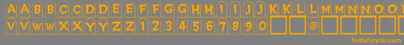 Creepygraves Font – Orange Fonts on Gray Background