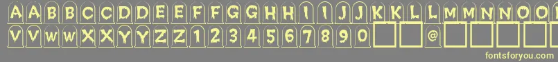 Creepygraves Font – Yellow Fonts on Gray Background