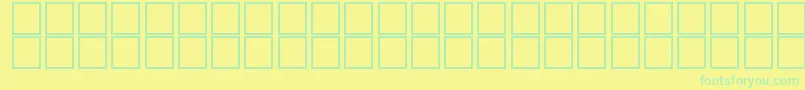 フォントAlKharashi5 – 黄色い背景に緑の文字