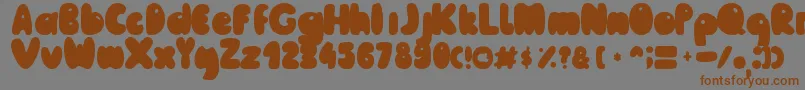 フォントMailePoohRegular – 茶色の文字が灰色の背景にあります。