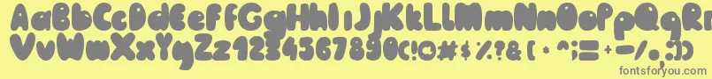 Fonte MailePoohRegular – fontes cinzas em um fundo amarelo