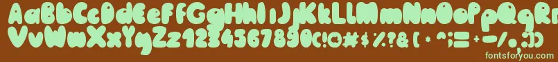 フォントMailePoohRegular – 緑色の文字が茶色の背景にあります。