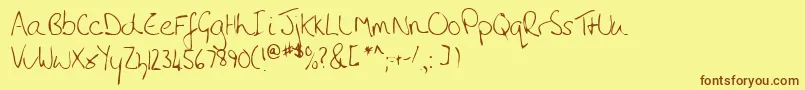 フォントLehn010 – 茶色の文字が黄色の背景にあります。
