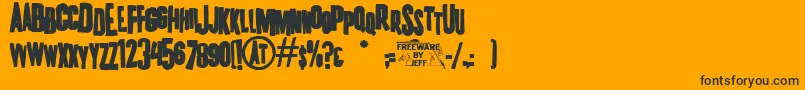 Czcionka K.P.DutyFrazzledJl – czarne czcionki na pomarańczowym tle