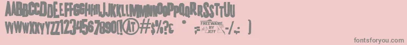K.P.DutyFrazzledJl-Schriftart – Graue Schriften auf rosa Hintergrund