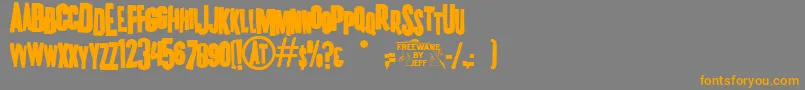 K.P.DutyFrazzledJl-Schriftart – Orangefarbene Schriften auf grauem Hintergrund