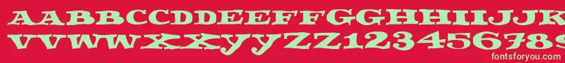 Fettecke Font – Green Fonts on Red Background