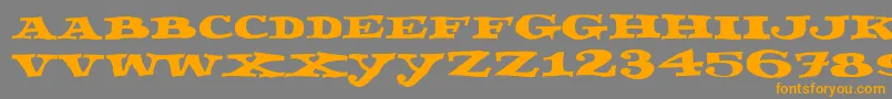 Fettecke Font – Orange Fonts on Gray Background