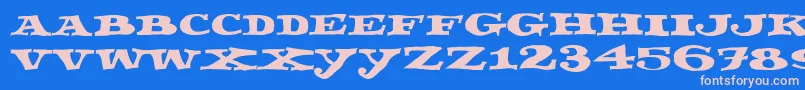 Fettecke Font – Pink Fonts on Blue Background