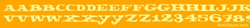 Fettecke Font – Yellow Fonts on Orange Background