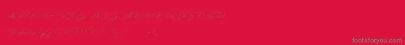 MademoiselleCatherine Font – Gray Fonts on Red Background